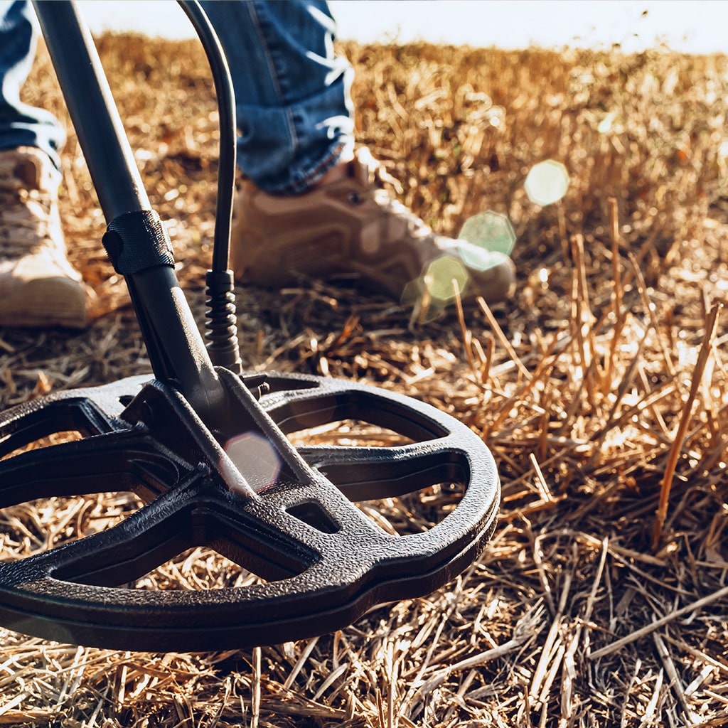 locating buried manhole with metal detector